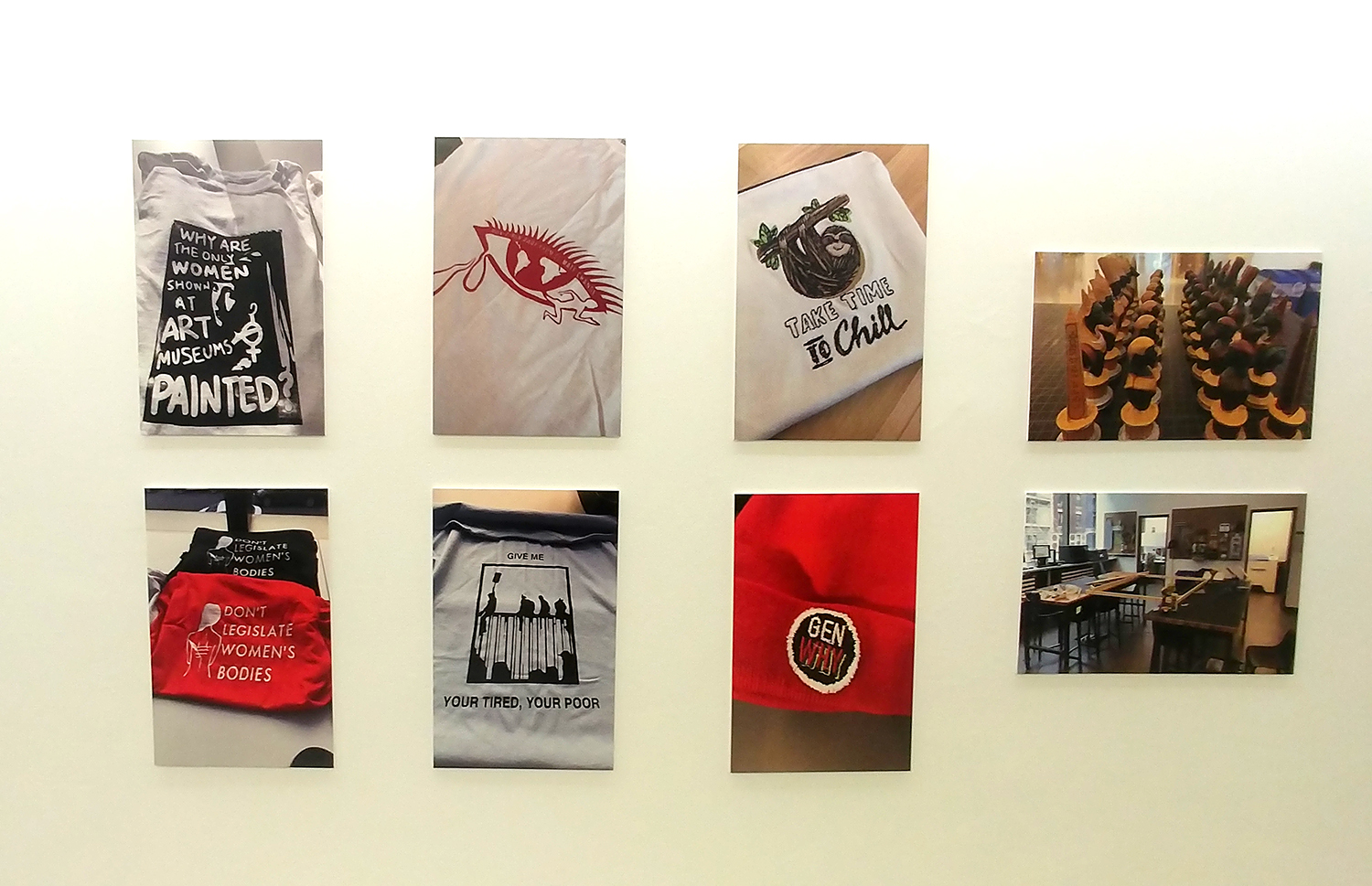 Photos of silk screen and embroidery projects hung up on the wall.