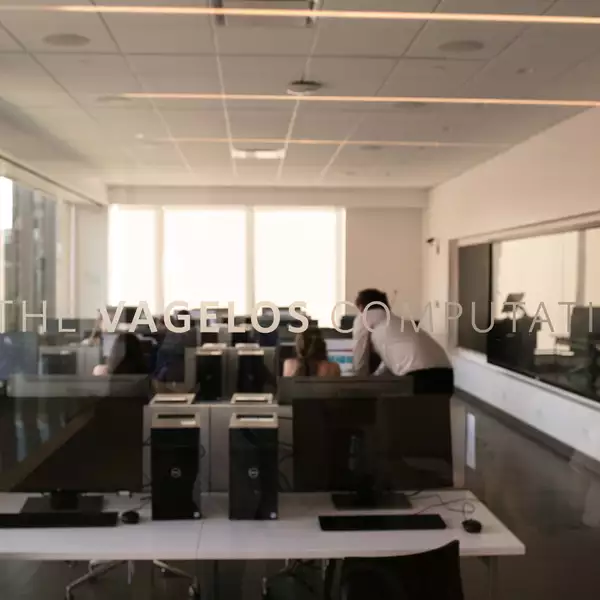Shows CSC lab space with 24 computer stations and viz wall screens